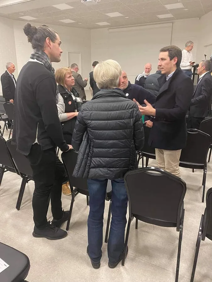 Henry engaging with community members