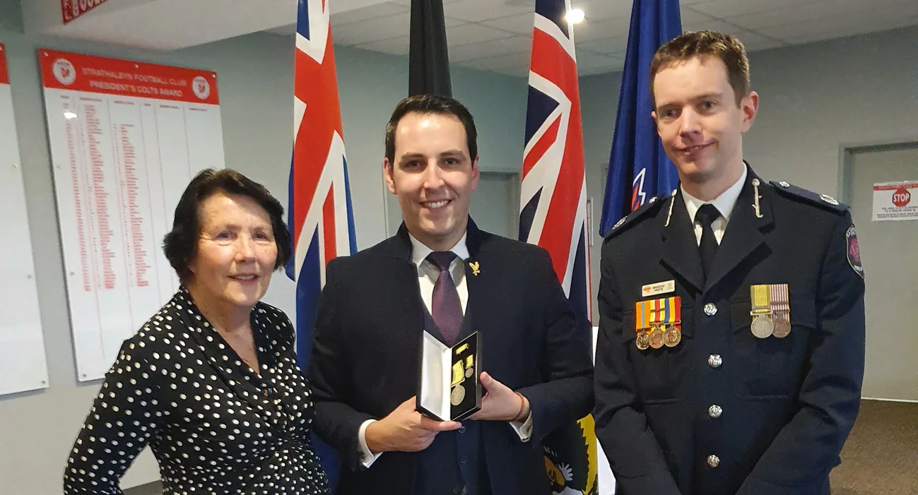 Henry Davis receiving the National Emergency Medal
